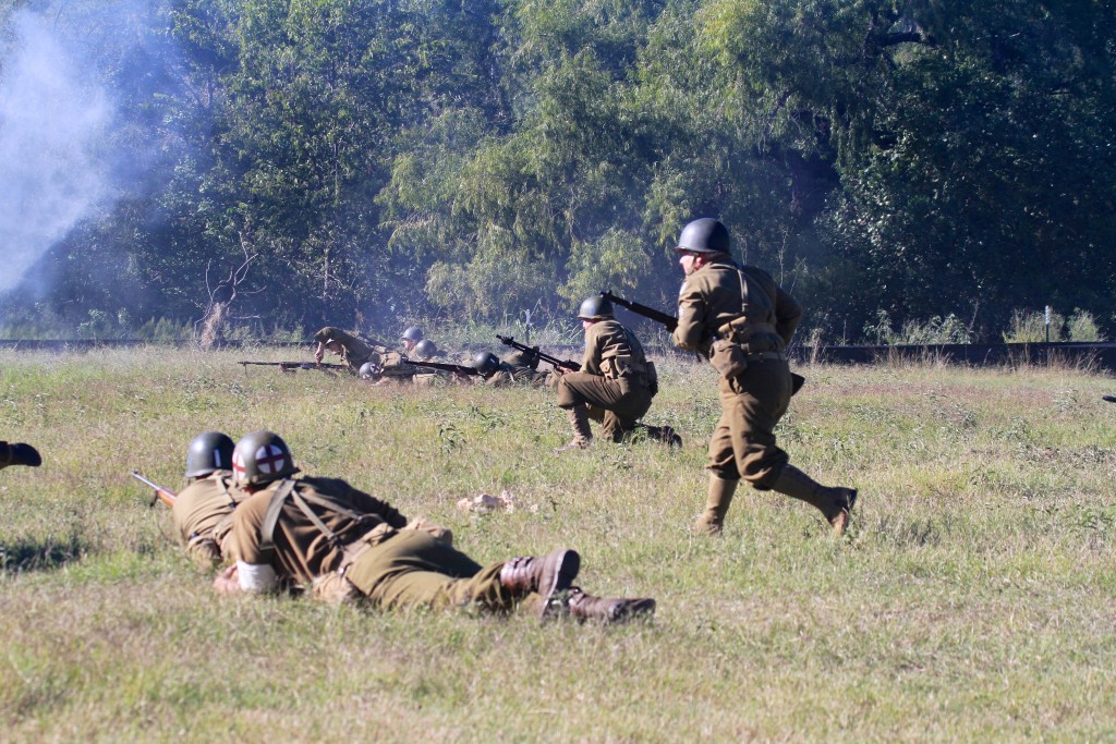 Moving forward under the cover of tank and Artillery fire